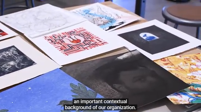 zuckerman tour Screenshot of the Zuckerman Archives. Several prints on a table being sorted