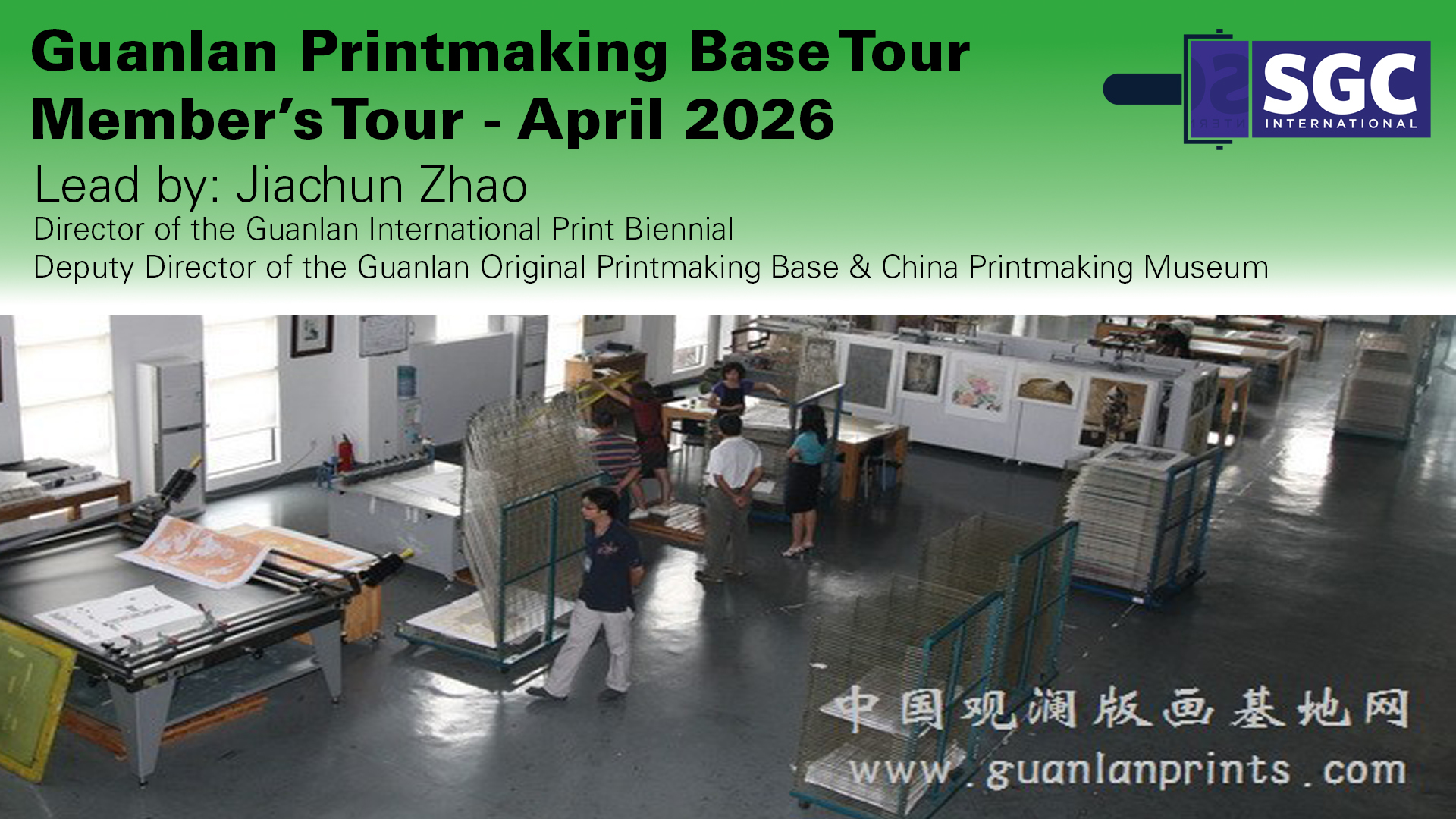 A group of people gathered around the etching press at Hello Print Friend Studio surrounded by large windows letting in lots of natural light.